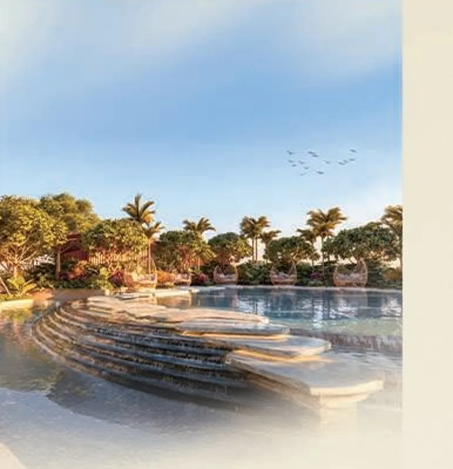 Tranquil swimming pool with cascading water features amid landscaped greens — artistic impression
